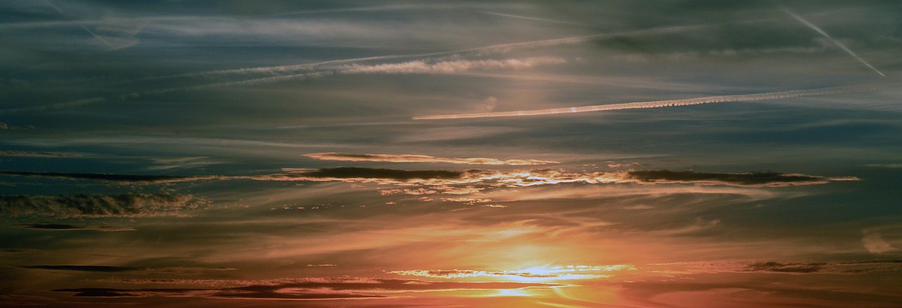 A calm sunset over water, representing finding peace amidst emotional waves.